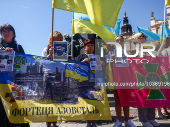 Families of Ukrainian soldiers and war prisoners and supporters attend a daily demonstration of solidarity with Ukraine at the Main Square i...