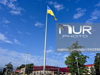 LVIV, UKRAINE - AUGUST 23, 2023 - A 25m flag of Ukraine flutters in the wind outside the Hetman Petro Sahaydachnyi National Army Academy on...