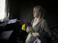 Ukraine, Odessa : A unidentified woman mourns inside the burnt trade union building in Odessa, Ukraine, May 8, 2014. More than 40 people die...