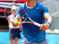 Rafael Nadal of Spain plays against Jarkko Nieminen of Finland in their third round match during day six of the Mutua Madrid Open tennis tou...