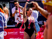 Swimmers seen celebrating for finisher during the 36th Hellspoint Swimtrek Europe to Asia Swim Race 30 August 2023 Canakkale/Turkey (