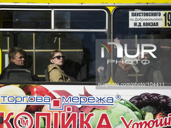 Ukraine - Odessa - Daily life - A woman looks out of a bus window, Odessa, Ukraine, Thursday, Mai 8, 2014. (Zacharie Scheurer) (
