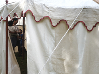 People take a look inside a replica of the war tent of Continental army General George Washington at the Revolutionary Germantown Festival i...
