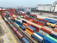 LIANYUNGANG, CHINA - OCTOBER 9, 2023 - Large machinery loads containers at the China-Kazakhstan (Lianyungang) Logistics Cooperation Base for...