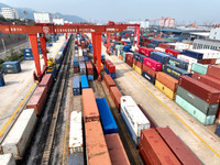 LIANYUNGANG, CHINA - OCTOBER 9, 2023 - Large machinery loads containers at the China-Kazakhstan (Lianyungang) Logistics Cooperation Base for...
