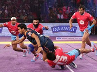 Players in action during the Pro Kabbadi league match between Jaipur Pink Panthers and Bengal Warriors at Sawai Mansingh indoor Stadium in J...