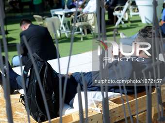 A congressman taking a break, during the last  day of Mobile World Congress in Barcelona, 24th of February, 2016. (