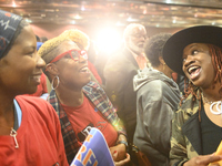 People in the crowd celebrate as Cherelle Parker, the Democratic nominee for Mayor of the sixth-largest city in the U.S., addresses supporte...