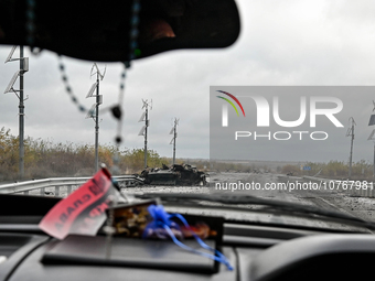 ZAPORIZHZHIA REGION, UKRAINE - NOVEMBER 4, 2023 - A destroyed military vehicle is seen on the road in Zaporizhzhia Region, southeastern Ukra...