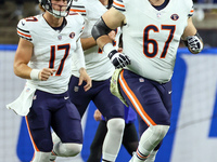 Chicago Bears quarterback Tyson Bagent (17) (L) and Chicago Bears guard Dan Feeney (67) (R) run onto the field prior to an NFL  football gam...