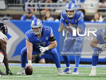Detroit Lions quarterback Jared Goff (16) prepares to catch a snap from Detroit Lions center Frank Ragnow (77) during  an NFL  football game...