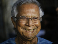 Nobel Peace Prize laureate and Grameen Telecom chairman Professor Muhammad Yunus speaks to journalists in front of a labor court in Dhaka, B...