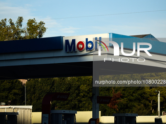 Mobil logo is seen on the gas station in Los Angeles, United States on November 13, 2023. (