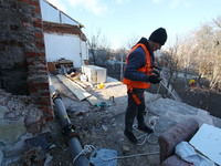 Residential and office buildings are being restored in Kharkiv, northeastern Ukraine, on November 30, 2023, after Russian shellings. NO USE...