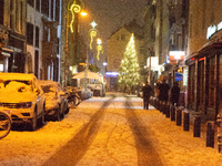 Snow is falling in Cologne, Germany, on December 3, 2023. (