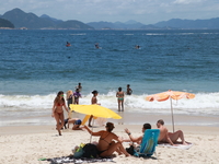 Bathers are moving along Copacabana beach in the south zone of Rio de Janeiro, Brazil, on December 13, 2023. (