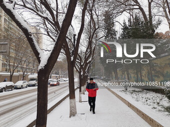 Snow is falling in Beijing, China, on December 13, 2023. (
