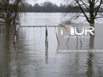 A children's playground is seen submerged under water along the Rhine River during the flooding season in Rondenkirchen, Cologne, Germany, o...