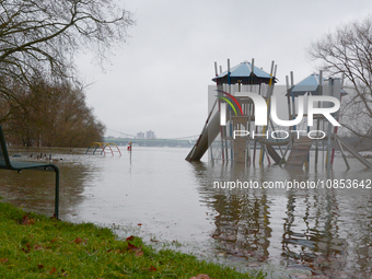 A children's playground is seen submerged under water along the Rhine River during the flooding season in Rondenkirchen, Cologne, Germany, o...