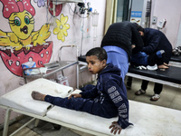 Medics are transporting Palestinians injured in Israeli bombardment into Shuhada Al-Aqsa Hospital in Deir El-Balah, in the central Gaza Stri...