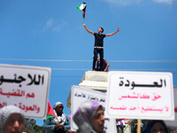 Palestinians during a rally to mark the anniversary of 66 for 