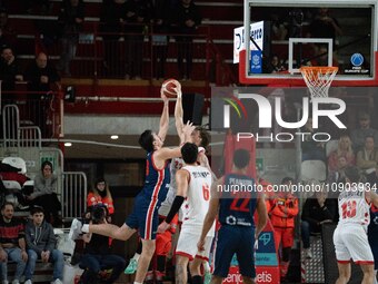 Sean McDermott of Itelyum Varese and Baciu Catalin of CSM Oradea are competing during the FIBA Europe Cup match between Openjobmetis Varese...