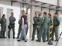 Military police are moving in the hangar of the air group in Sao Paulo, Brazil, on January 12, 2024, after finding the helicopter that went...