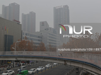 The urban area is shrouded in smog in Fuyang, China, on January 14, 2024. (