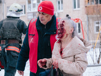 An elderly woman is being accompanied by a medical worker after suffering from shelling, in Kharkiv, Ukraine, on January 23, 2024. On The Mo...