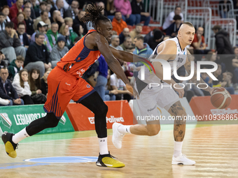 Jerry Boutsiele and Dariusz Wyka are playing during the FIBA Europe Cup match between Legia Warszawa and Bahcesehir College in Warsaw, Polan...