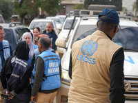A Delegation From The United Nations High Commissioner For Refugees (UNHCR), The World Health Organization (WHO), And UN Representatives For...