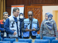 A Delegation From The United Nations High Commissioner For Refugees (UNHCR), The World Health Organization (WHO), And UN Representatives For...