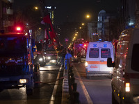 Ambulances and firefighters are at the site of the fire at the Gandhi Hotel Hospital in northern Tehran, on January 25, 2024. Patients are b...