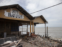 An abandoned restaurant building is being destroyed by high waves in Cemarajaya Village, Karawang Regency, West Java Province, on January 26...