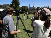 Jannik Sinner of Italy is speaking with the Norman Brookes Challenge Cup after winning the 2024 Australian Open Final at the Royal Botanic G...