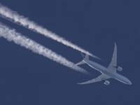 Air Canada Boeing 787-9 Dreamliner passenger aircraft as seen flying in the blue sky at 36.000 ft altitude high over the Netherlands in Euro...
