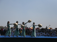 Chinese artists are performing a cultural dance in Kathmandu, Nepal, on February 12, 2024, to celebrate Chinese New Year at a culture fair a...