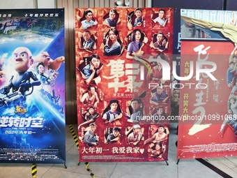 Citizens are passing movie posters at a cinema in Shanghai, China, on February 10, 2024. (