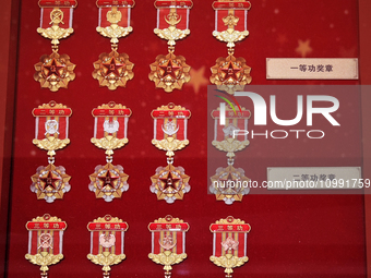 The first, second, and third Class Merit Medals are on display at the Military Museum of the Chinese People's Revolution in Beijing, China,...