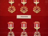 The First and Second Class War Merit Medals are on display at the Military Museum of the Chinese People's Revolution in Beijing, China, on F...