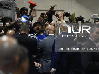 Former U.S. President Donald is working the rope line after briefly appearing on stage at SneakerCon at the Pennsylvania Convention Center i...