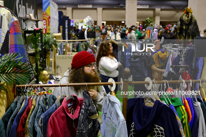 People are browsing the merchandise on display during the 15th SneakerCon at the Pennsylvania Convention Center in Philadelphia, PA, USA, on...