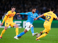 Andreas Christensen of FC Barcelona and Jean Cajuste of SSC Napoli compete for the ball during the UEFA Champions League Round of 16 first l...