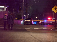 Police officers are investigating a shooting on the 300 Block of 63rd Street, NE in Washington, DC, United States, on February 23, 2024. The...