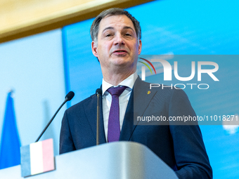 Belgian Prime Minister Alexander De Croo is speaking during a press conference after his meeting with Polish Prime Minister Donald Tusk and...