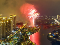 A fireworks show for the 2024 Lantern Festival is being staged over Longjiang Park in Fuqing, China, on February 23, 2024. (