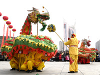 Folk artists are performing a dragon dance in Handan, China, on February 24, 2024. (