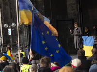 Henriette Reker, the mayor of Cologne, is speaking on stage while thousands of people are taking part in a rally in support of Ukraine on th...