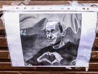 A graphic in tribute to Alexiei Navalny in front of the Russian Consulate General in Krakow, Poland on February 24, 2024. Navalny, 47, Russi...