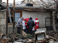 Volunteers from the Ukrainian Red Cross Society are providing help to people affected by the Russian overnight drone attack in Odesa, Ukrain...